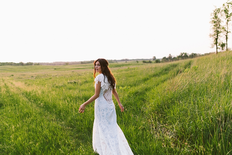 bride running in field
