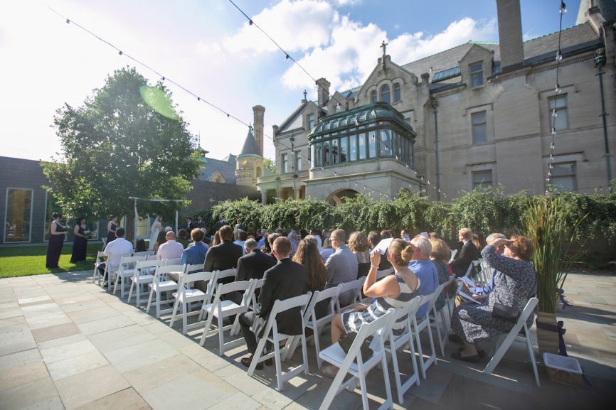 guests sitting in their seats at the ceremony 