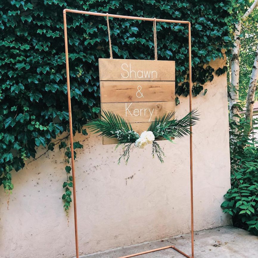 copper_pipe_with_rustic_wedding_sign_