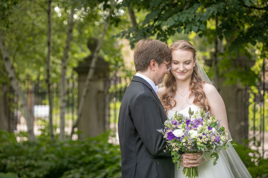 bide and groom embracing