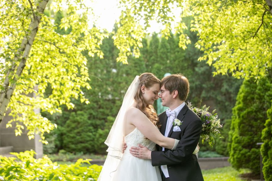 bride and groom embracing