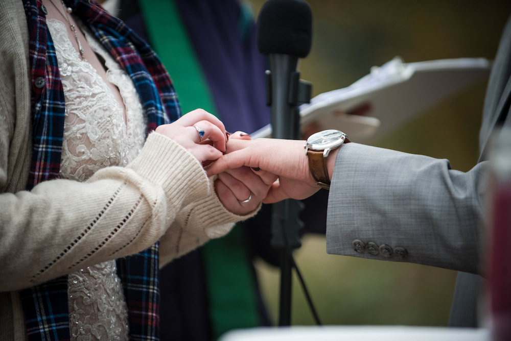 bride wearing cardigan and flannel