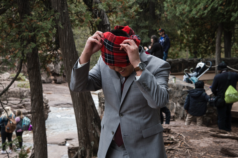 groom taking off the blindfold