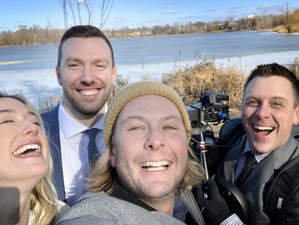 selfie with bride, groom, and videographers 