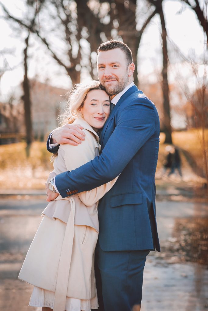 bride and groom hugging