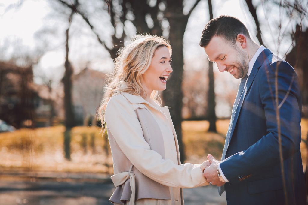 bride and groom laughing 