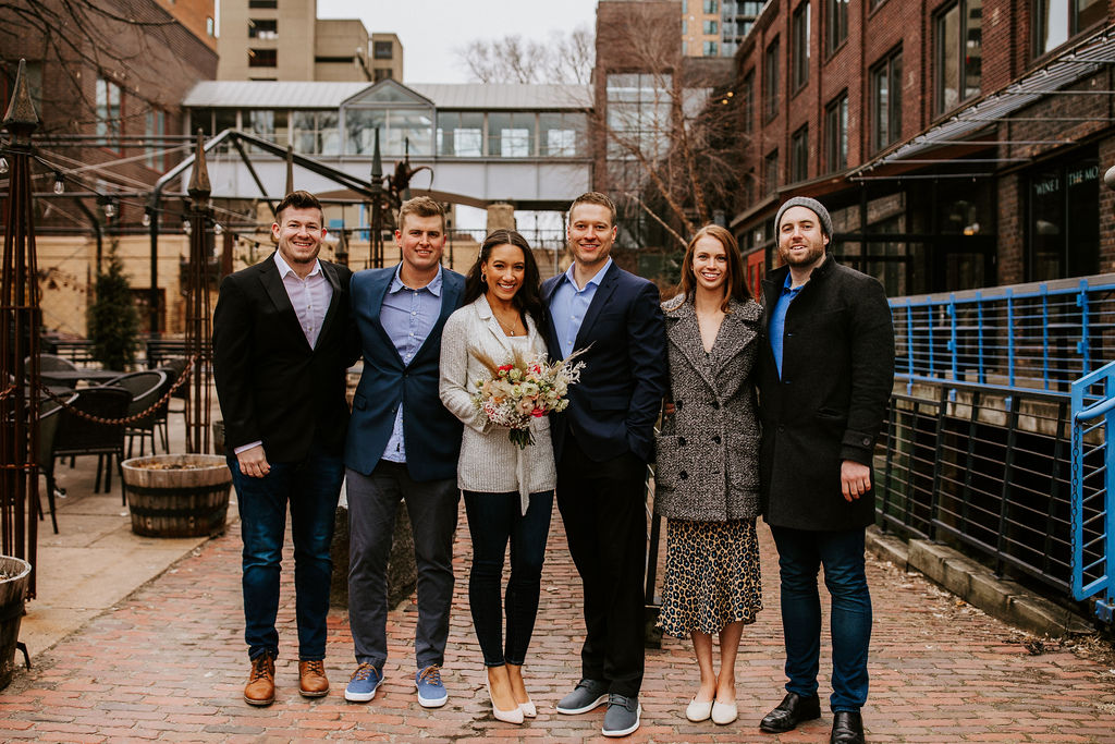 bride and groom with friends 