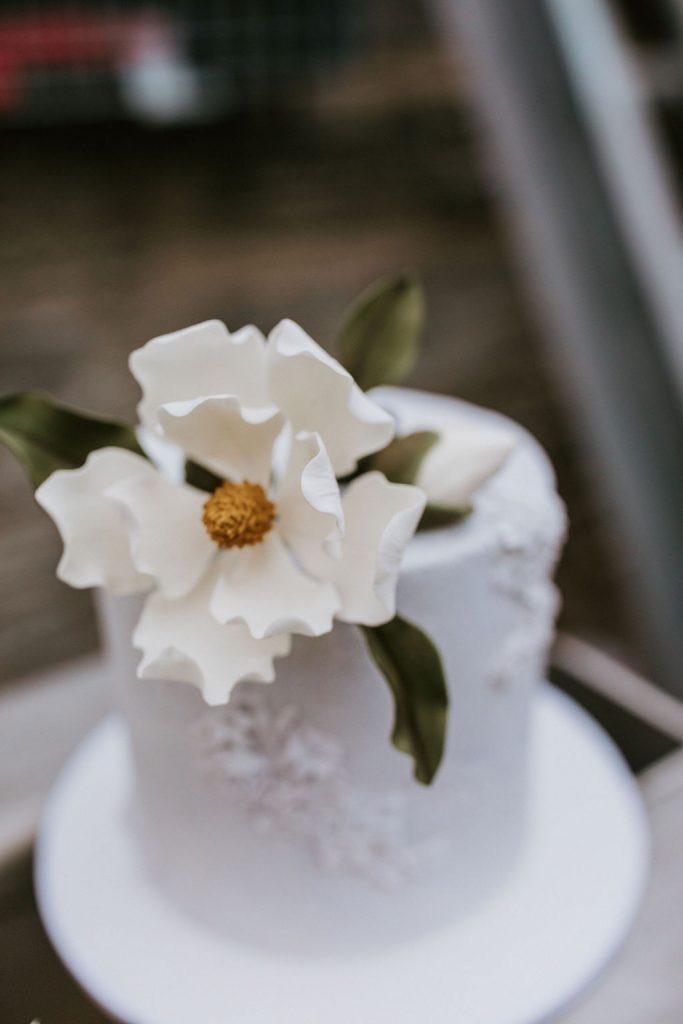 wedding cake with white flowers
