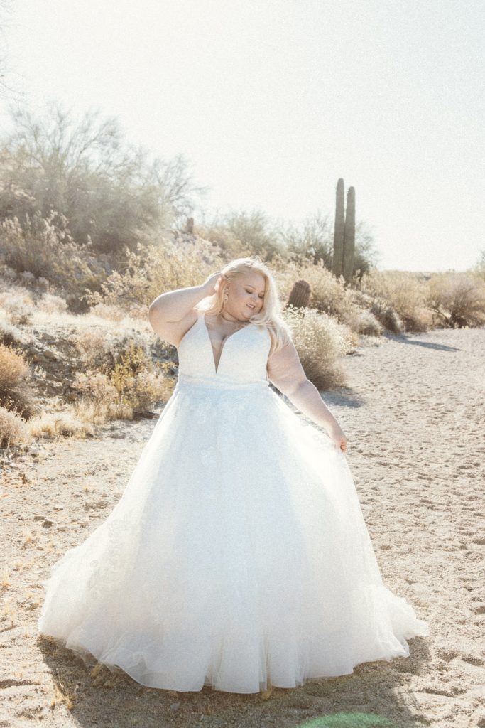 bride in wedding dress in desert