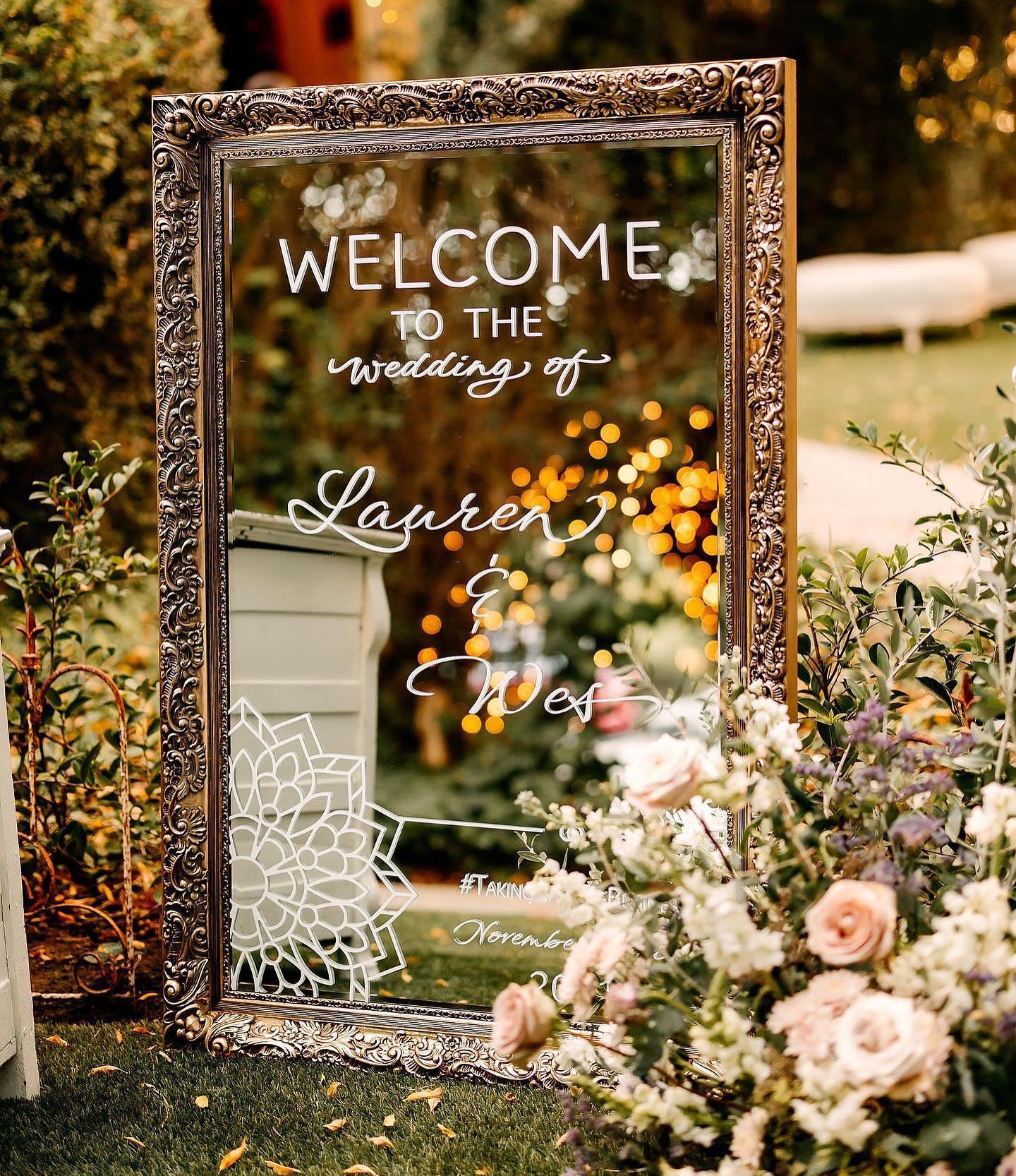 wedding welcome mirror sign with florals 