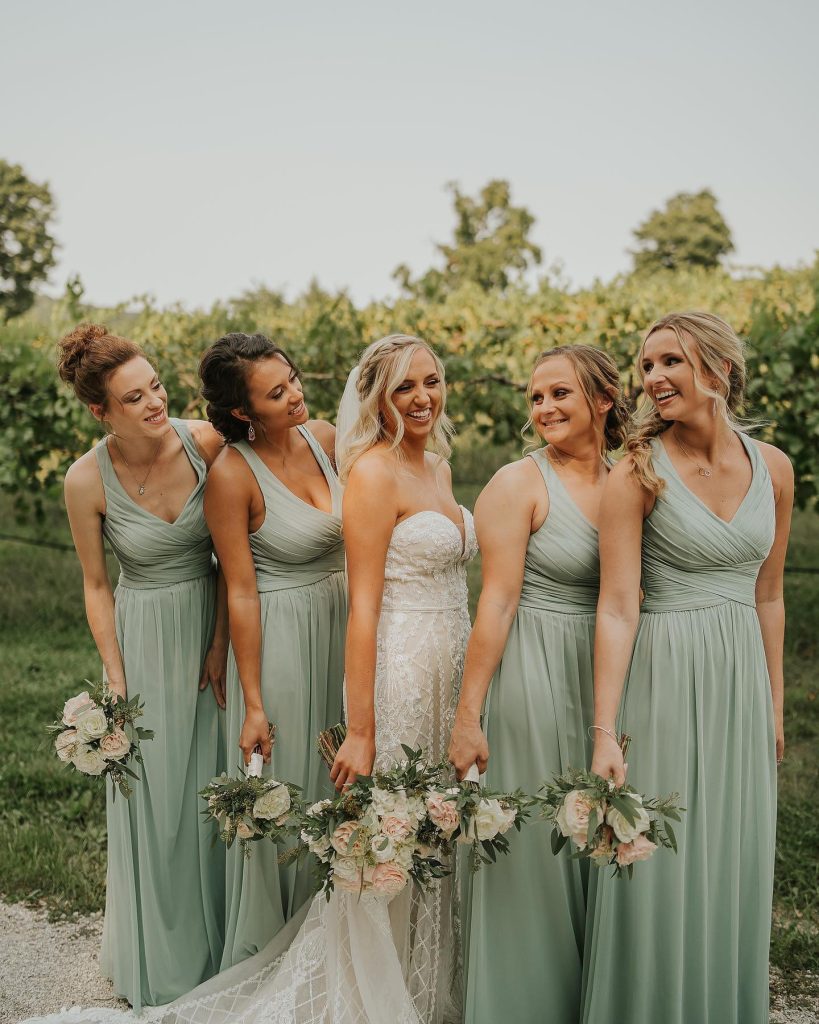 bride and bridesmaids outdoors