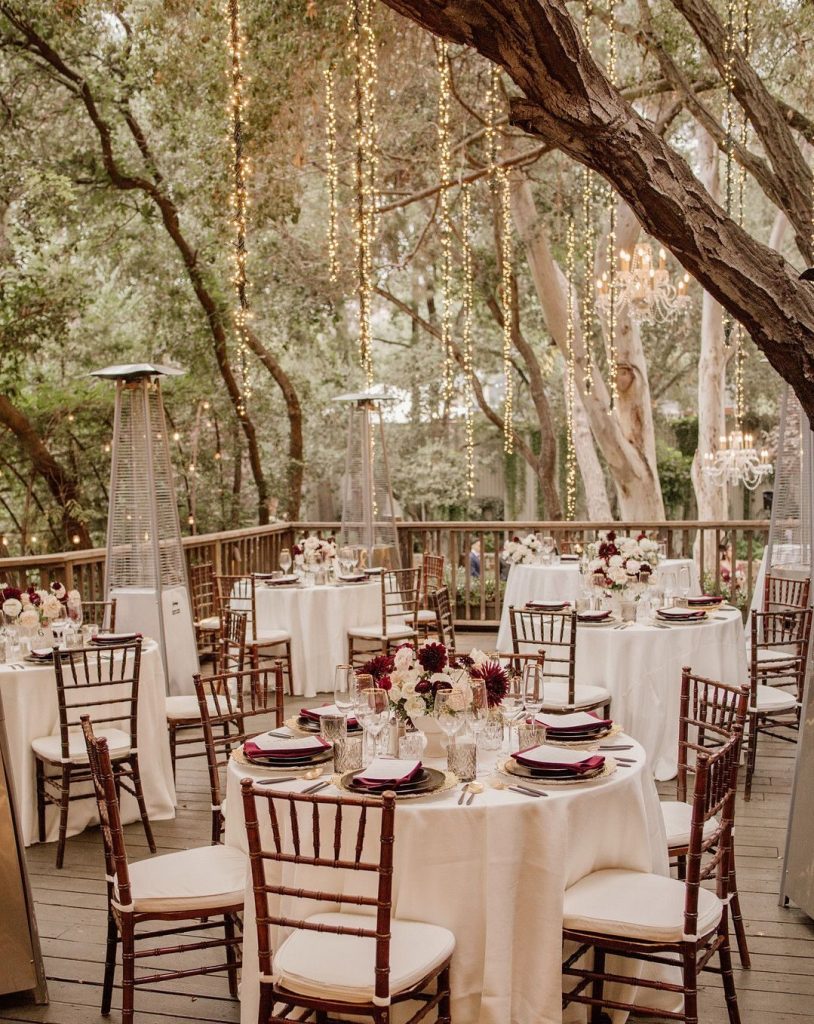 outdoor wedding reception with lights