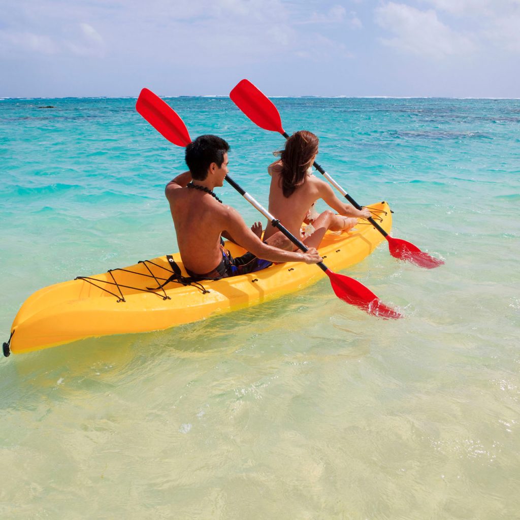 couple kayaking - wedding gift registry ideas