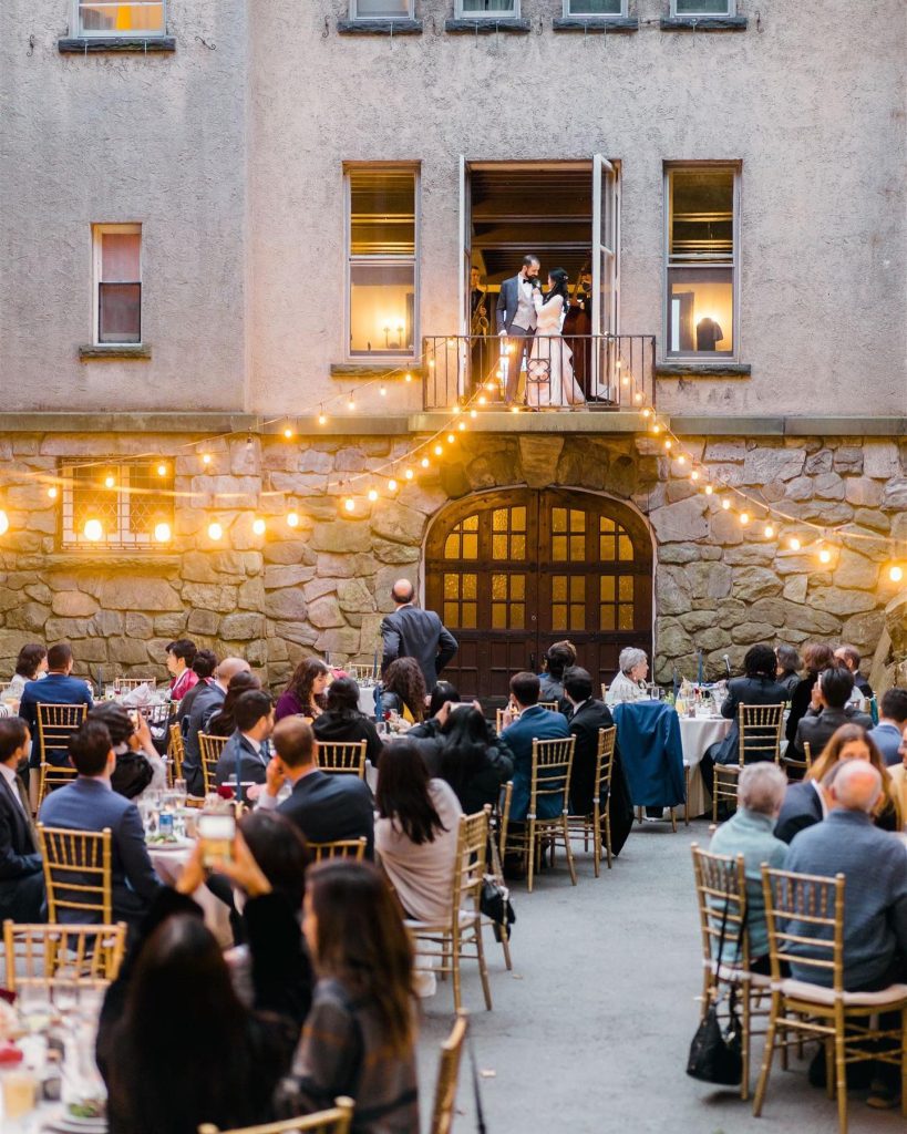 outdoor wedding reception with lights