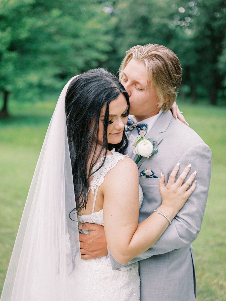 bride and groom at romantic barn wedding in Texas
