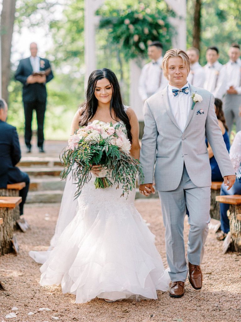 bride and groom at romantic barn wedding in Texas