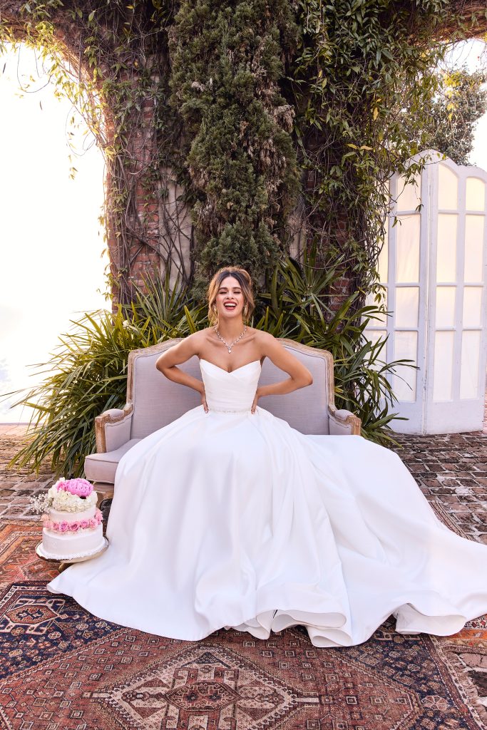 Kelsey Anderson poses in a Spring 2025 David's Bridal wedding dress