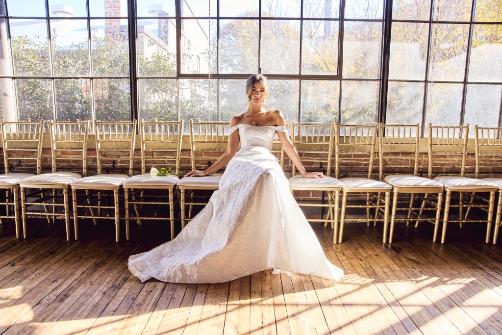 Kelsey Anderson poses in a Spring 2025 David's Bridal wedding dress