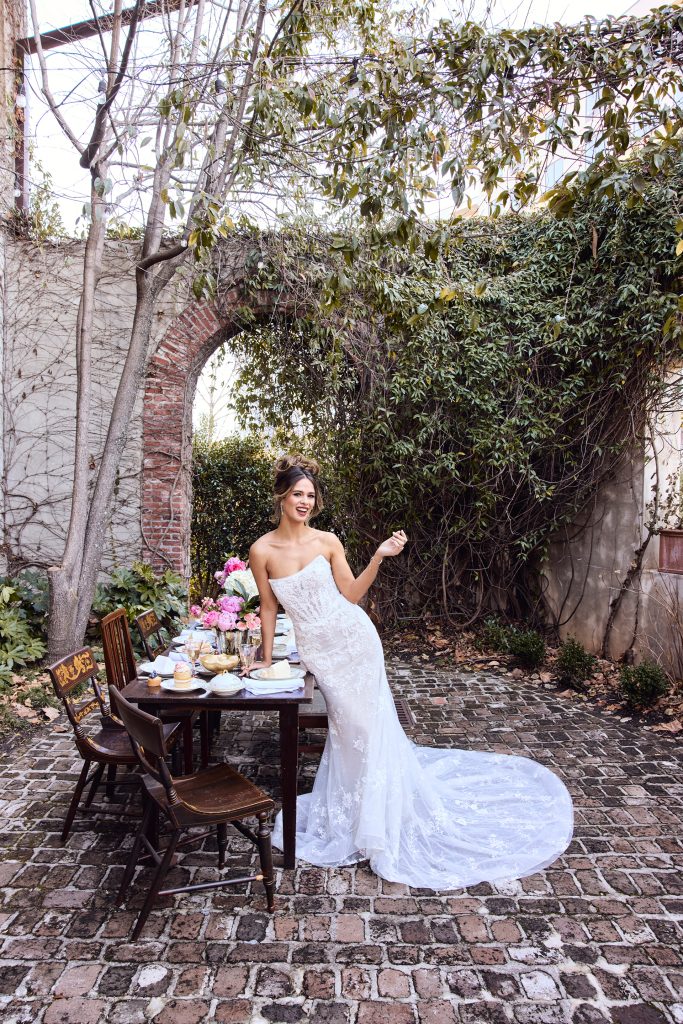 Kelsey Anderson poses in a Spring 2025 David's Bridal wedding dress