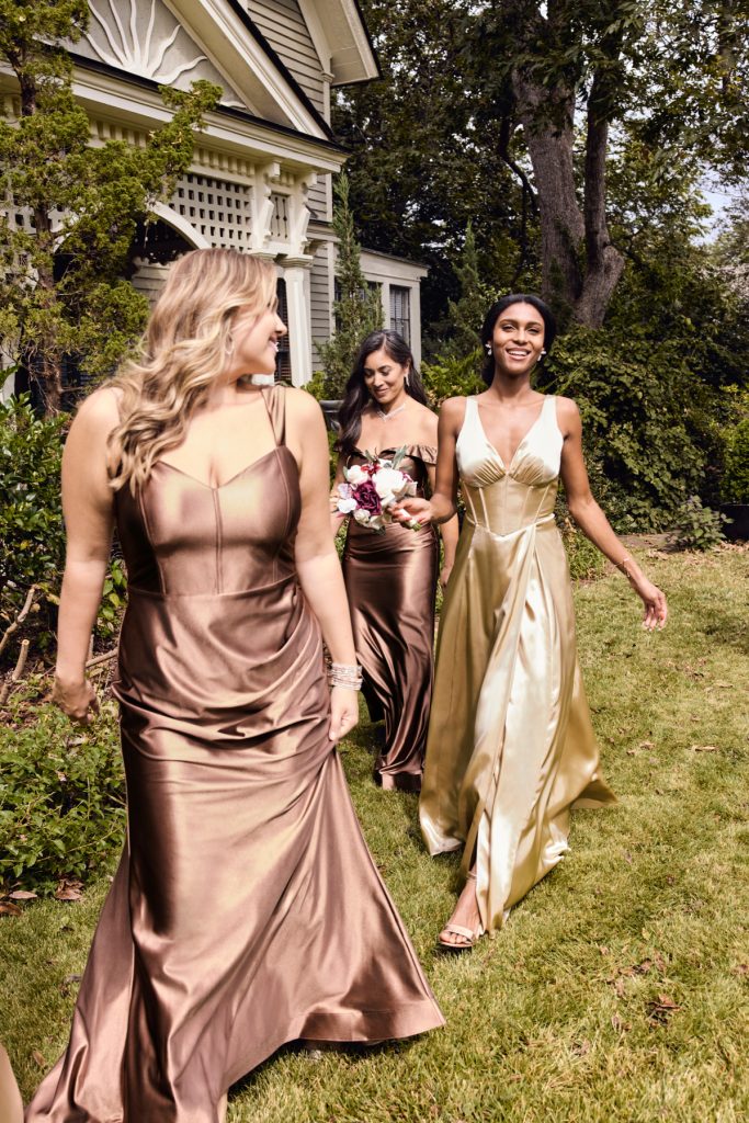 Women in champagne bridesmaid dresses
