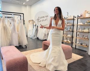 A bride finds her dress at Diamonds & Pearls, a bridal boutique from David's Bridal